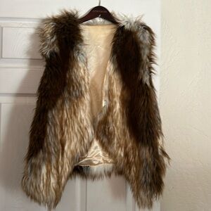 Faux fur vest, satin lined